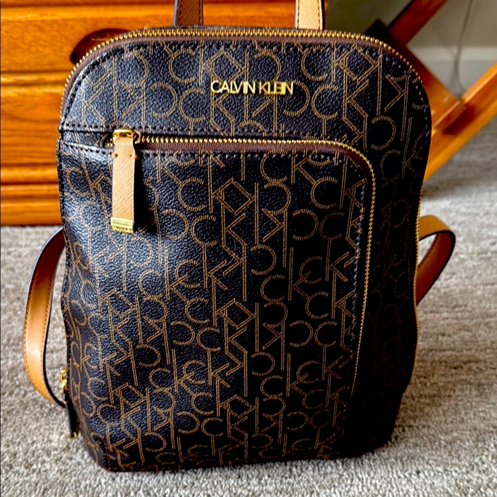 Calvin Klein Brown Monogram Backpack with Gold Accents